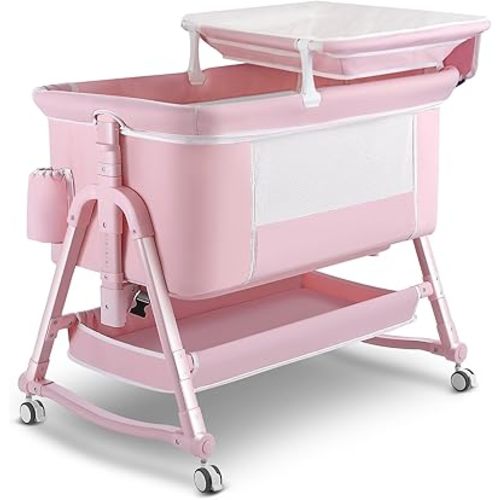 4 in 1 Baby Bassinet Bedside Sleeper, Portable Bassinets with Wheels, Baby Crib with Changing Station, Mattress and Storage Included, Foldable Bedside Bassinet for Small Place- Pink