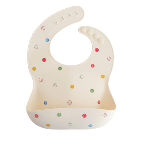 mushie Silicone Baby Bib | Adjustable Fit Waterproof Bibs (Smiley Face)