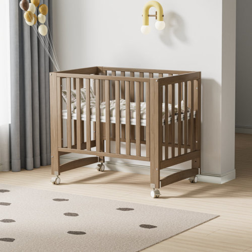 EvoNest 6-in-1 Portable Convertible Cradle to Mini Crib With Removable Wheels