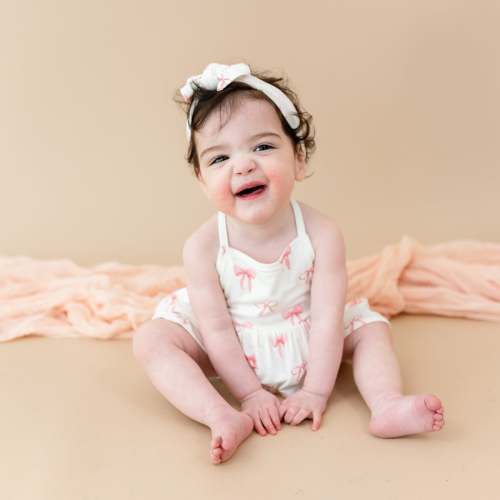 Spaghetti Strap Ruffle Romper in Bow