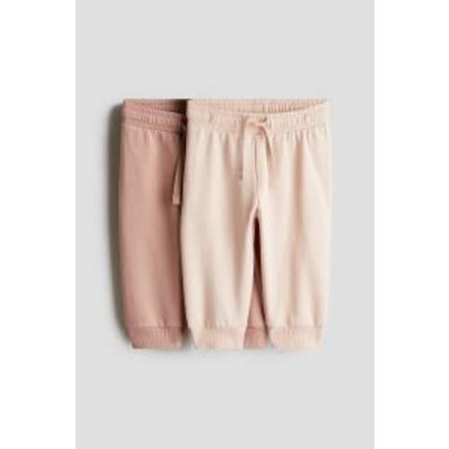 2-pack Joggers, 6m - Beige/natural white melange - Kids | H&M US