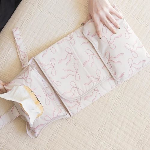 Pink bows Tiny Twinkle Portable Diaper Changing Pad | Waterproof, Wipeable & Compact Baby Changing Pad for Travel | Smart Wipes Pocket & Organized Storage| Newborn Shower Gift (Bows)