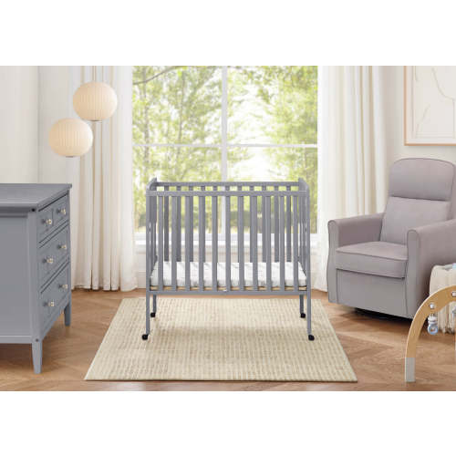 Lee Portable Folding Mini Crib with 1.5-Inch Mattress | Delta Children