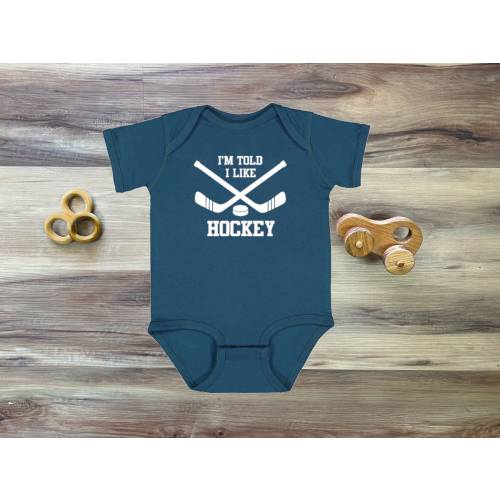 I&#39;m Told I Like Hockey Silhouette Baby Bodysuit Boys & Girls- Trendy Gift for Newborn and Birthday - Gender Neutral, Sports, Baby gift