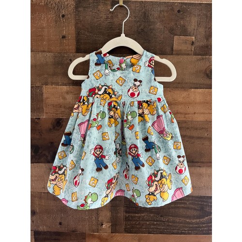 Level Up Baby Girl, Little Girl dress made with licensed Mario fabric