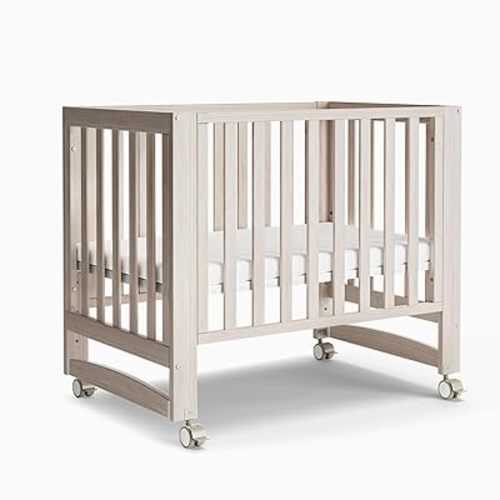 EvoNest Baby Crib, 6 in 1 Convertible Mini Crib with Wheels, 100% New Zealand Pinewood Growing Bed, 4 Adjustable Mattress Height (Washed Natural,Mini)