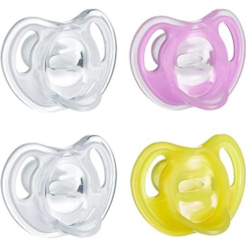 Tommee Tippee Ultra-Light Silicone Pacifier, 6-18 Months, Symmetrical One-Piece Design, BPA-Free Silicone Binkies, Clear/Pink/Yellow, Pack of 4