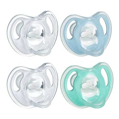 Tommee Tippee Ultra-Light Silicone Pacifier, Symmetrical One-Piece Design, BPA-Free Silicone Binkies, 0-6m, 4-Count - Clear, Blue, Green