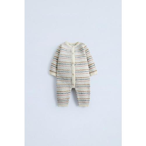 STRIPED KNIT MULTI-POSITION JUMPSUIT