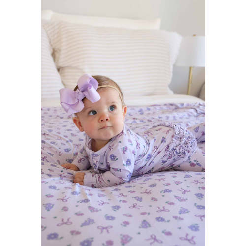 Ribbon & Roses Ruffle Zipper Footie in Purple | Caden Lane