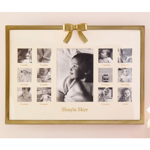 Ava Ribbon First Year Metal Frame.           Design Template: Garamond (Style 17)
Text: "Shayla Skye", Gold (YK)