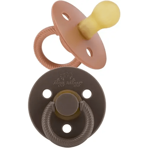 Itzy Ritzy Natural Rubber Pacifiers Set of 2 – Natural Rubber Newborn Pacifiers with Cherry-Shaped Nipple & Large Air Holes for Added Safety; Set of 2 in Chocolate & Caramel, Ages 0 – 6 Months