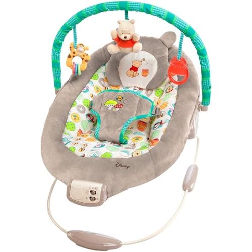 Bright Starts Disney Baby Winnie The Pooh Baby Bouncer Soothing Vibrations Deluxe Infant Seat - Faux Suede, Music, Removable -Toy Bar, 0-6 Months 6-20 lbs (Dots & Hunny Pots)