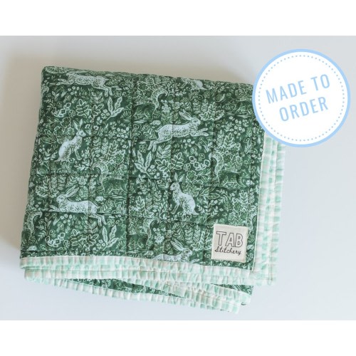 Modern heirloom baby quilt, baby shower gift for boy, Rifle Paper Co wholecloth quilt, woodland rabbits and green gingham crib blanket
