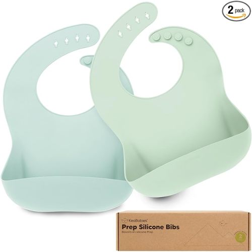 KeaBabies 2-Pack Silicone Bibs for Babies, Toddlers Girl, Boy – Sturdy Food-Grade Baby Bibs for Eating, Large Food Catcher, Clean & Put On Easily, Waterproof Toddler Feeding Essentials(Pastel Sky)