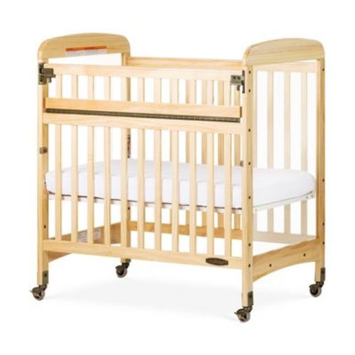 Child Craft Avery SafeAccess Wooden Compact Portable Crib, 2 Easy Roll Locking Wheels, Durable Wood Construction, Fits Through Doorways (Natural)