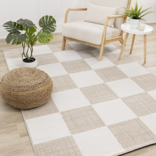 Ebern Designs Wum Collection Cream/Beige Area Rug & Reviews | Wayfair
