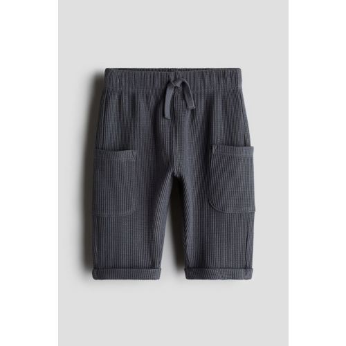 Waffled Cotton Pants, Regular waist, Long, Dark gray, Kids | H&M USH&MH&MInstagramTikTokYouTubePinterestFacebookH&MWaffled Cotton Pants, Regular waist, Long, Dark gray, Kids | H&M USWaffled Cotton Pants, Regular waist, Long, Dark gray, Kids | H&M USWaffle