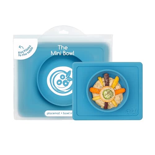 ezpz Mini Bowl for 12 Months+ (Blue) - 100% Silicone Suction Bowl with Built-in Placemat for Toddlers - Comes with a Reusable Travel Bag