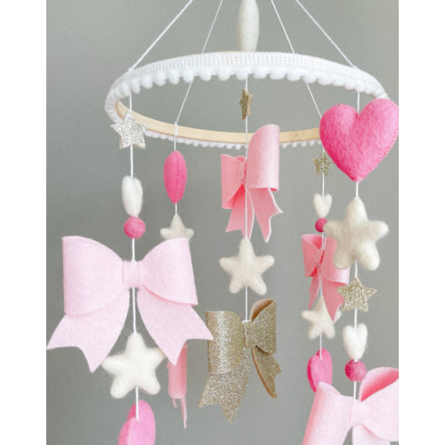Baby girl crib mobile with bows