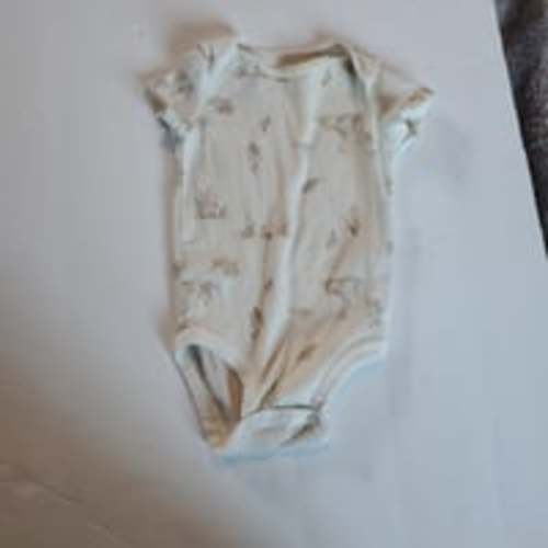 Carters cream color with ducks onesie size 3month