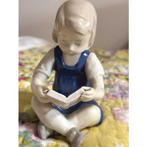 Young Girl reading a book cross legged. Carl Scheidig Gräfenthal Porcelain Figurine.
