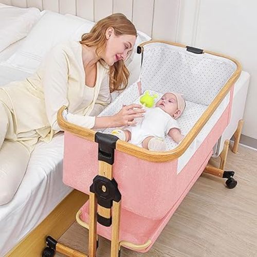 Baby Bassinet Bedside Sleeper, 3 in 1 Bedside Bassinet, 6 Height Adjustable Easy Folding Portable Bedside Crib with Mosquito Net for Newborn Infant, Storage Basket and Wheels (Pink)