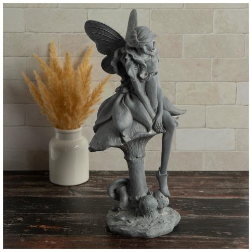 Fairy Sitting On A Mushroom