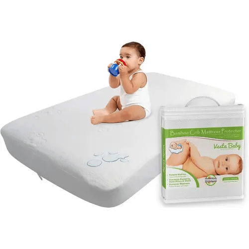 Vesta Baby Crib Mattress Protector - 52” x 28” Noiseless Waterproof Pad Cover - Absorbent Soft Jacquard Bamboo Rayon Fitted Sheet for Infant & Toddler Potty Training