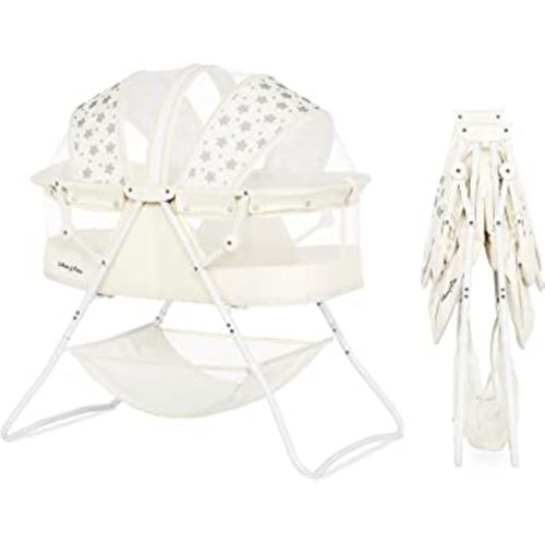 Dream On Me Karley Bassinet in French White, Lightweight Portable Baby Bassinet, Quick Fold and Easy to Carry , Adjustable Double Canopy, Indoor and Outdoor Bassinet with Large Storage Basket.