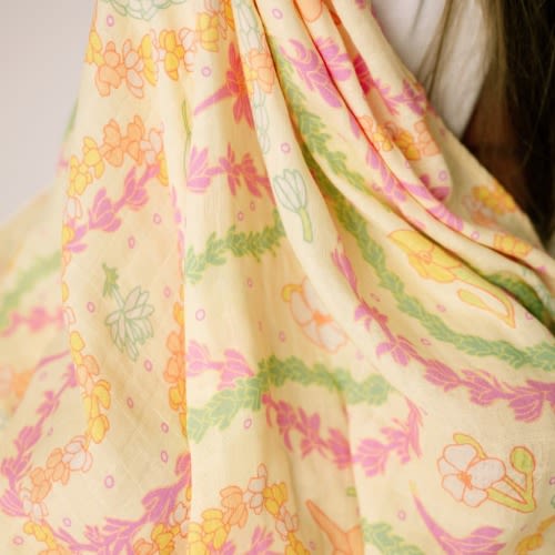 Lei Day in Sand Muslin Swaddle Blanket