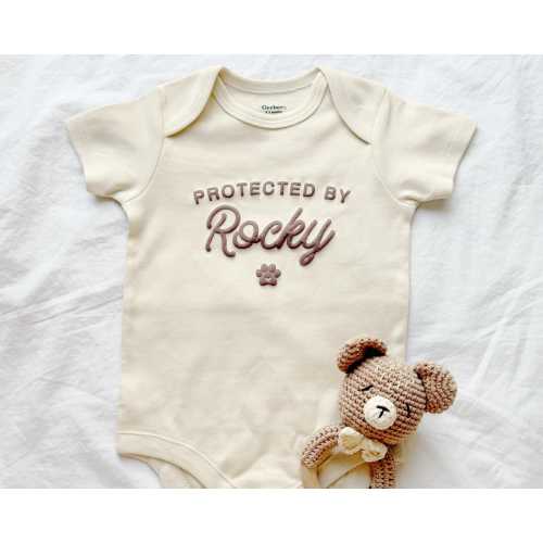 Protected By Dog Baby Onesie®, New Best Friend Onesie®, Pregnancy Announcement, Personalized Baby Shower Gift, Custom Natural Baby Bodysuit