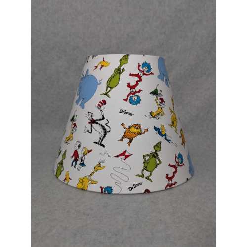 Dr. Seuss shade. White. Characters are random. Cat in the hat, Horton, who, thorax, thing. Shades are 9.5" x 5" x 7" tall