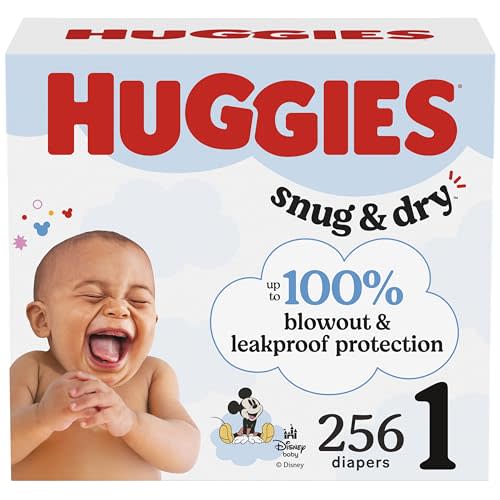 Huggies Size 1 Diapers, Snug & Dry Newborn Diapers, Size 1 (8-14 lbs), 256 Count (4 Packs of 64), Packaging May Vary