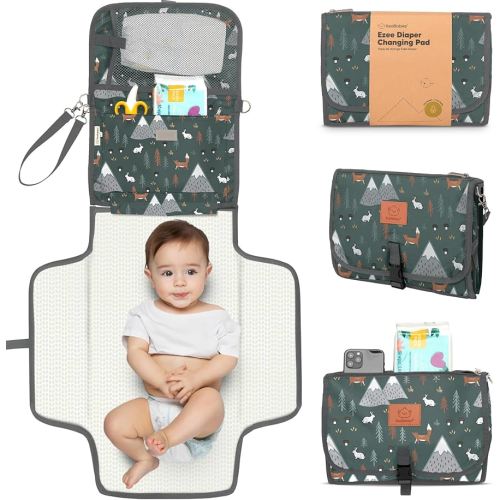 KeaBabies Portable Diaper Changing Pad - Large Waterproof Baby Changing Mat, Compact Travel Diaper Clutch, Functional Pockets Fit Newborn Essentials, Wipeable & Padded Baby Changer (Woods)