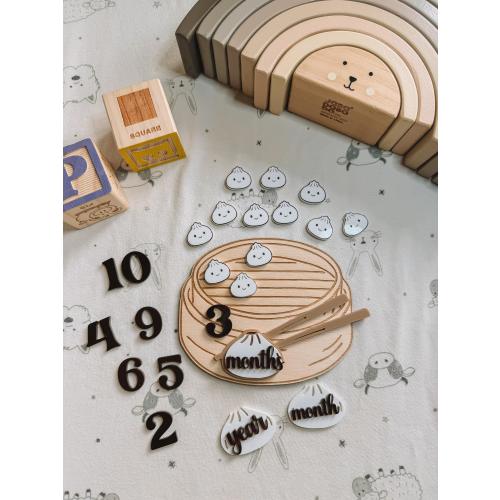 DUMPLING MONTHLY MILESTONE