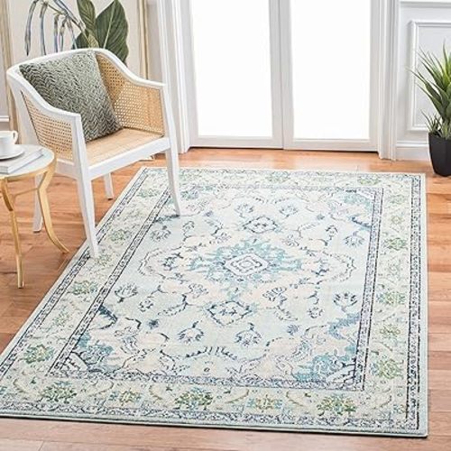 SAFAVIEH Monaco Collection Area Rug - 6'7" x 9'2", Light Blue & Ivory, Boho Chic Medallion Distressed Design, Non-Shedding & Easy Care, Ideal for High Traffic Areas in Living Room, Bedroom (MNC243K)