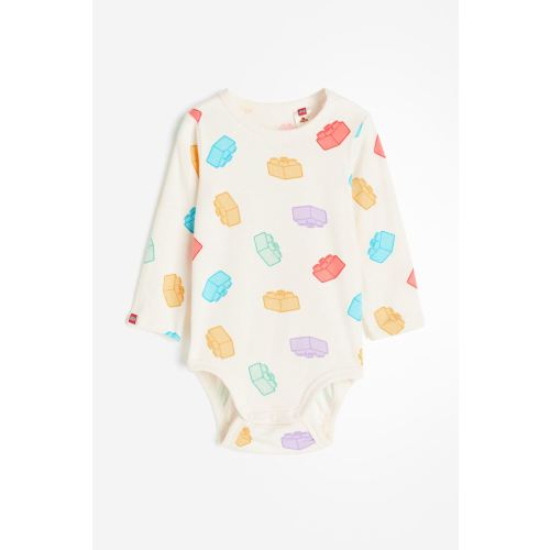 Patterned Long-sleeved Bodysuit, White/LEGO DUPLO, Kids | H&M USH&MH&MInstagramTikTokYouTubePinterestFacebookH&MPatterned Long-sleeved Bodysuit, White/LEGO DUPLO, Kids | H&M USPatterned Long-sleeved Bodysuit, White/LEGO DUPLO, Kids | H&M USPatterned Long-