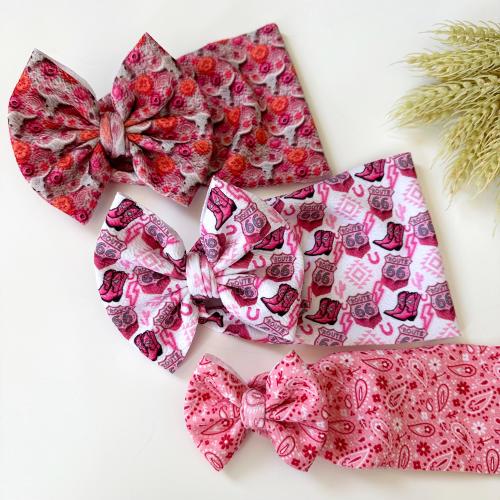 Pink western cowgirl country bow outfit | Route 66 bow | pink and red paisley nylon headband | boots head wrap | howdy cow skull headwrap