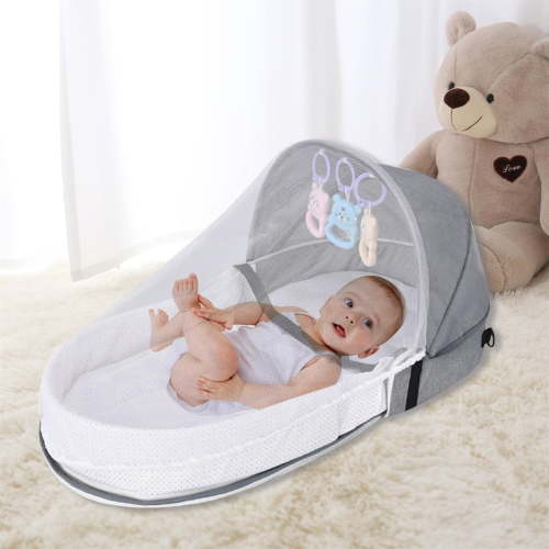 Portable Baby Crib 0-12 Months – Foldable Bassinet with Breathable Mesh & Toys for Travel