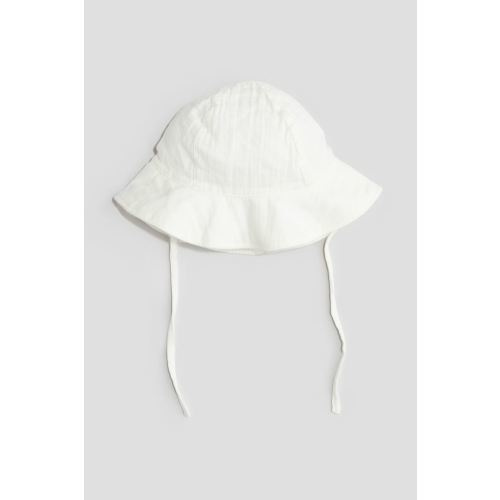 Cotton Muslin Sun Hat, White, Kids | H&M USH&MH&MInstagramTikTokYouTubePinterestFacebookH&MCotton Muslin Sun Hat, White, Kids | H&M USCotton Muslin Sun Hat, White, Kids | H&M USCotton Muslin Sun Hat, White