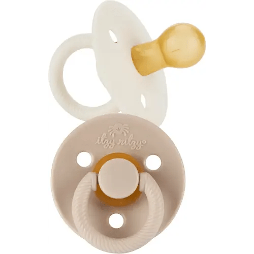 Itzy Ritzy Natural Rubber Pacifiers, Set of 2 – Natural Rubber Newborn Pacifiers with Cherry-Shaped Nipple & Large Air Holes for Added Safety; Set of 2 in Coconut & Toast, Ages 6-18 Months