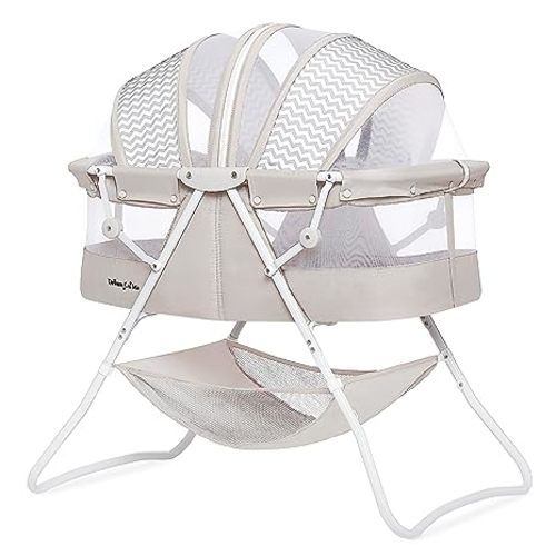 Karley Bassinet in Grey, Lightweight Portable Baby Bassinet, Quick Fold and Easy to Carry , Adjustable Double Canopy, Indoor and Outdoor Bassinet with Large Storage Basket.