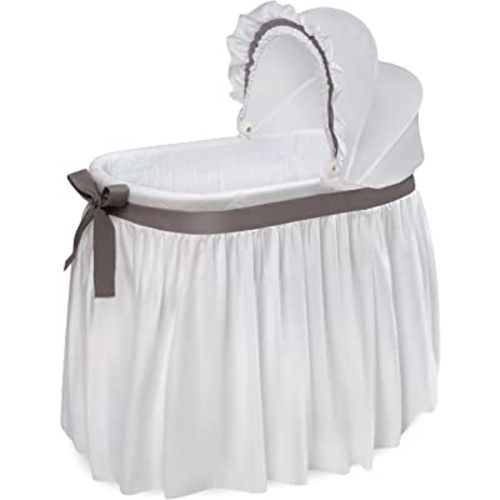 Wishes Oval Rocking Baby Bassinet with Bedding, Storage, and Pad