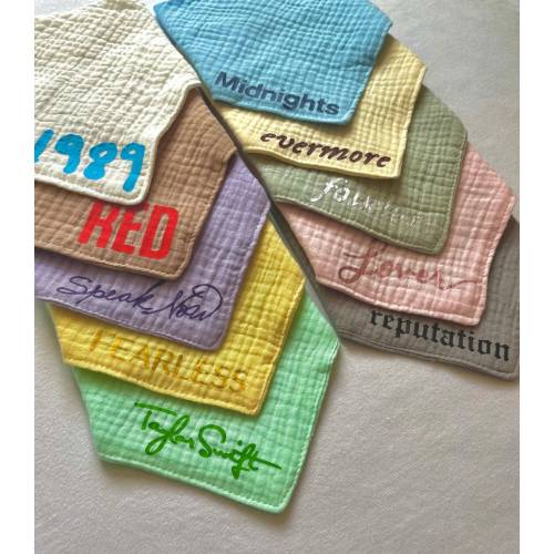 Swiftie Baby Dribble Bib with adjustable snaps, soft and absorbent - all of Taylor Swift ERAs!