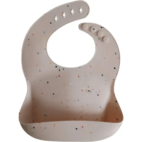 mushie Silicone Baby Bib | Adjustable Fit Waterproof Bibs (Vanilla Confetti)