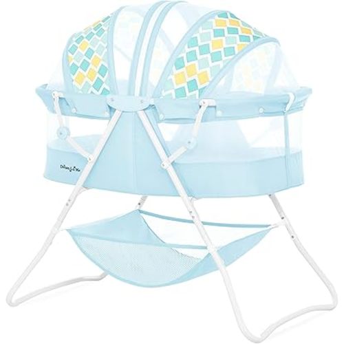 Dream On Me Karley Bassinet in Pink, Lightweight Portable Baby Bassinet, Quick Fold and Easy to Carry, Adjustable Double Canopy, Indoor and Outdoor Bassinet with Large Storage Basket.