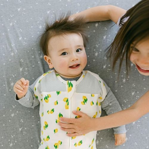 Happiest Baby Sleepea 5-Second Swaddle - Organic Cotton Baby Swaddle Blanket - Doctor Designed Promotes Healthy Hip Development (Ivory Lemons, Medium)