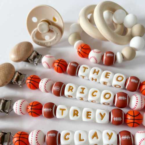 Baseball, Football, Basketball Sports Pacifier Clip • Personalize with Baby Boy or Girl Name • Custom Sports Mom Gift for Newborn