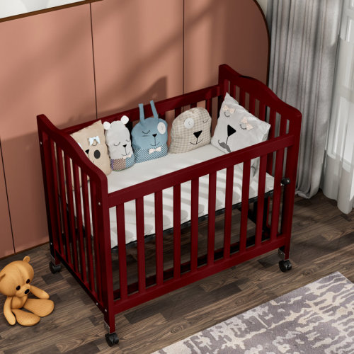 Harriet Bee Hinojosa Mini Crib With 3 Position Adjustable Mattress Board & Reviews | Wayfair